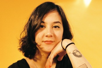 Photo of Michelle Zauner with a Yellow Background