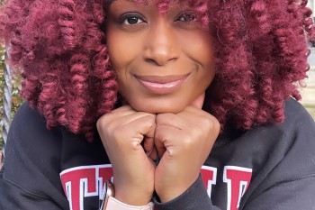 Headshot of Feminista Jones with Red Hair 